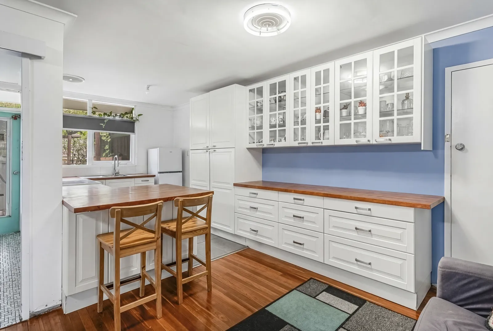 Virtual decluttering of a furnished Perth property photograph